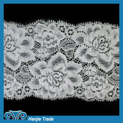 Bulk Raschel Lace Trim on White Mesh #4-2096